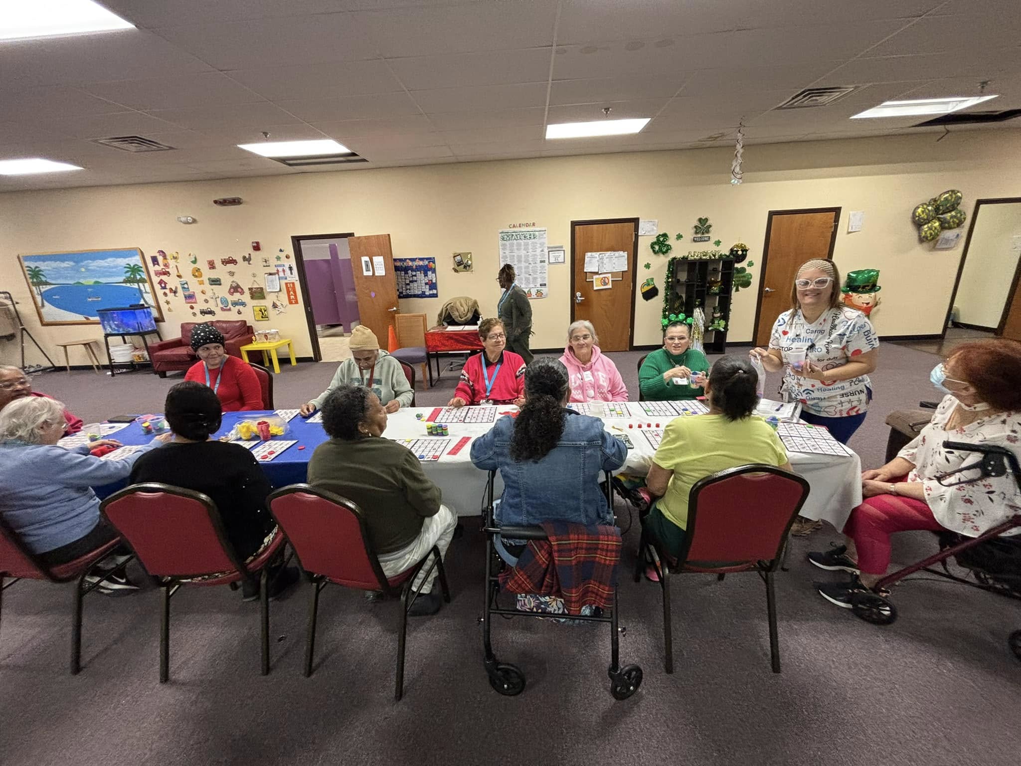 Residents in green attire